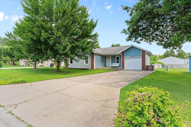 502 Sunrise St, Strafford, MO 65757 - view of front of property with an attached garage, brick siding, driveway, and a front lawn