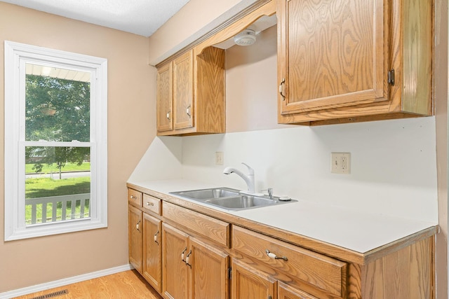 502 Sunrise St, Strafford, MO 65757 - kitchen featuring light countertops and light wood-type flooring