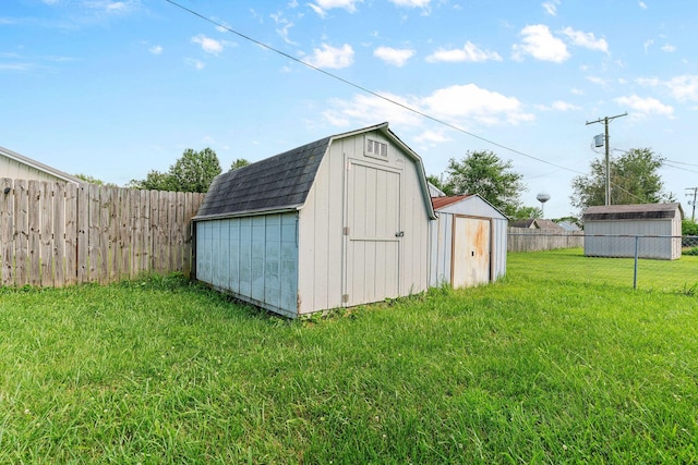 502 Sunrise St, Strafford, MO 65757 - view of shed with a fenced backyard