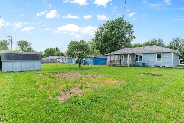 502 Sunrise St, Strafford, MO 65757 - view of yard featuring a shed and a wooden deck