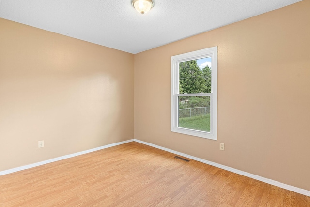 502 Sunrise St, Strafford, MO 65757 - unfurnished room with light wood finished floors and baseboards