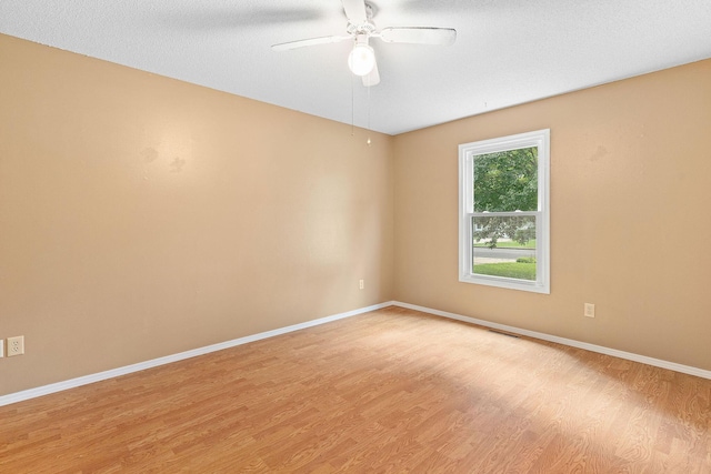 502 Sunrise St, Strafford, MO 65757 - spare room featuring light wood-style flooring and a ceiling fan