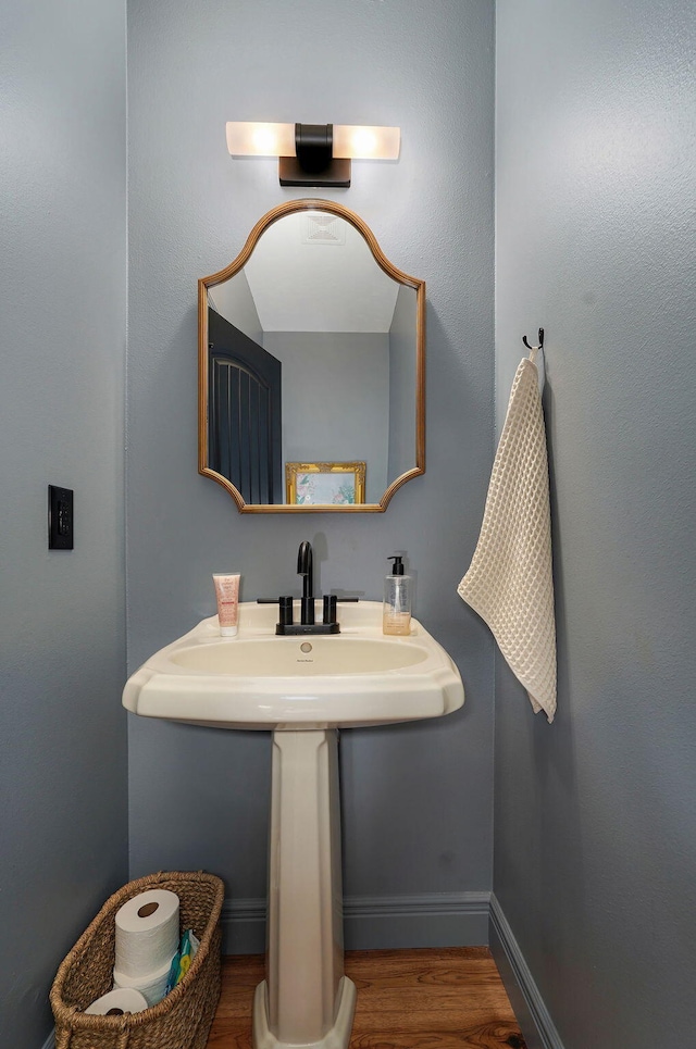 1421 N Rockingham Ave, Nixa, MO 65714 - bathroom with wood finished floors