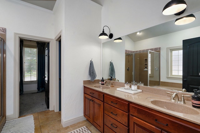 1421 N Rockingham Ave, Nixa, MO 65714 - full bath with a shower stall, double vanity, tile patterned flooring, and crown molding