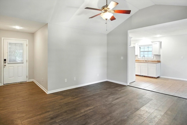 184 Crestwood Dr, Marshfield, MO 65706 - unfurnished living room featuring lofted ceiling, ceiling fan, and wood finished floors