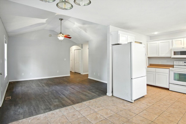 184 Crestwood Dr, Marshfield, MO 65706 - kitchen with white appliances, white cabinets, a ceiling fan, arched walkways, and lofted ceiling