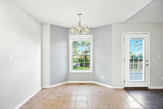 184 Crestwood Dr, Marshfield, MO 65706 - unfurnished dining area featuring a chandelier and tile patterned floors