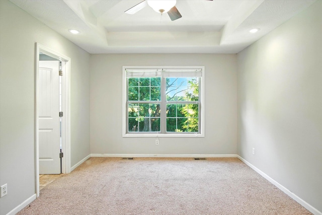184 Crestwood Dr, Marshfield, MO 65706 - carpeted empty room with a tray ceiling, a ceiling fan, and recessed lighting
