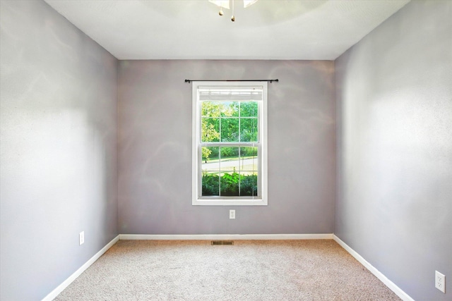 184 Crestwood Dr, Marshfield, MO 65706 - carpeted empty room with baseboards