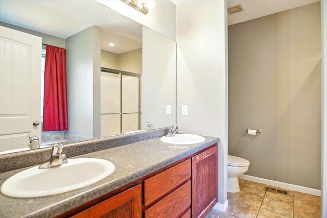 184 Crestwood Dr, Marshfield, MO 65706 - full bathroom with double vanity, an enclosed shower, and tile patterned floors