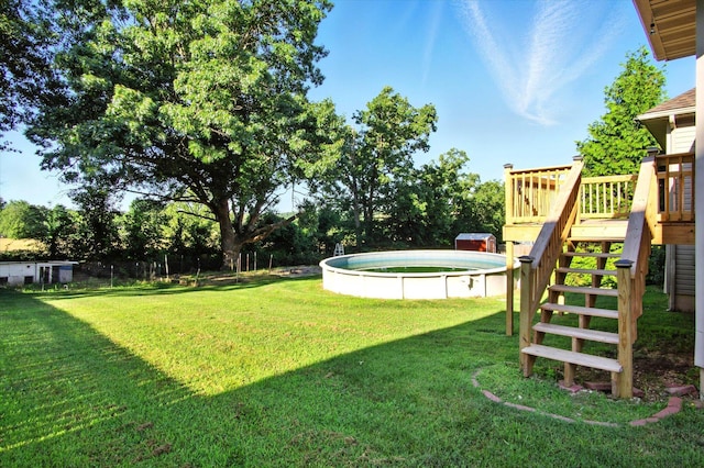 184 Crestwood Dr, Marshfield, MO 65706 - view of grassy yard with a jacuzzi, stairway, and a deck