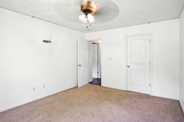184 Crestwood Dr, Marshfield, MO 65706 - unfurnished bedroom with carpet, a ceiling fan, and a closet