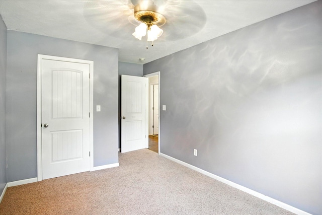 184 Crestwood Dr, Marshfield, MO 65706 - unfurnished bedroom with carpet flooring and a ceiling fan