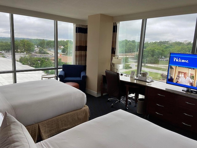 200 S Sycamore St Unit 902, Branson, MO 65616 - bedroom featuring a desk and baseboards