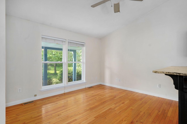2001 S 16th Ave, Ozark, MO 65721 - unfurnished room with light wood-style flooring, a ceiling fan, and lofted ceiling