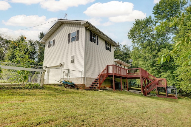 2001 S 16th Ave, Ozark, MO 65721 - rear view of house featuring stairway, a garage, a wooden deck, and a gate