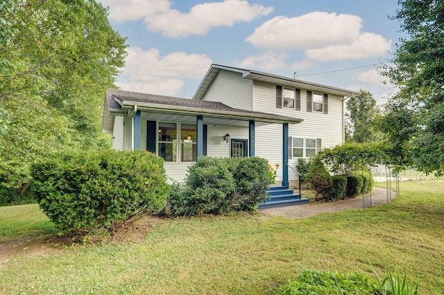 2001 S 16th Ave, Ozark, MO 65721 - view of front of house with a front yard, covered porch, and roof with shingles