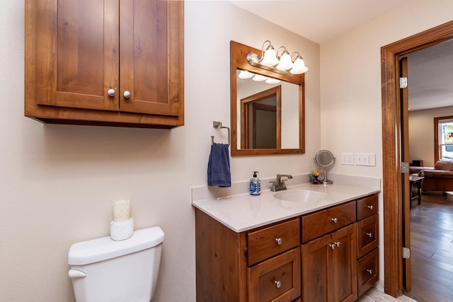 120 E Kennedy Blvd, Buffalo, MO 65622 - bathroom featuring vanity and wood finished floors