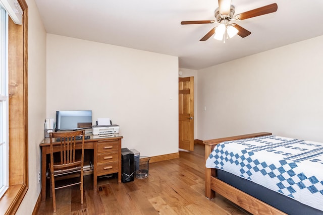 120 E Kennedy Blvd, Buffalo, MO 65622 - bedroom with light wood finished floors and a ceiling fan