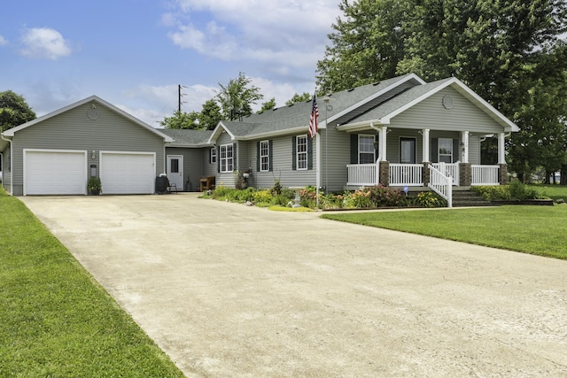 120 E Kennedy Blvd, Buffalo, MO 65622 - ranch-style house with covered porch, driveway, an attached garage, a shingled roof, and a front lawn