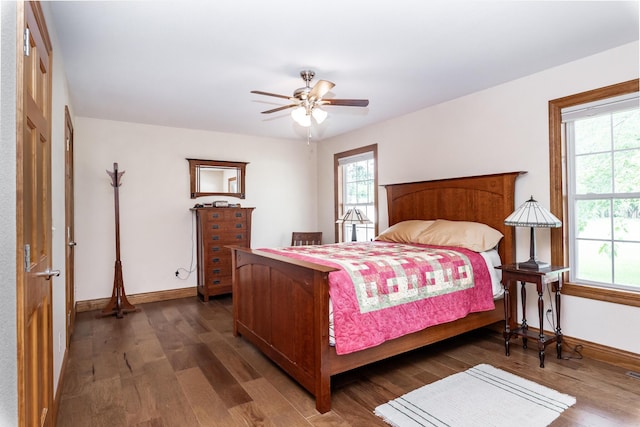 120 E Kennedy Blvd, Buffalo, MO 65622 - bedroom with multiple windows, wood finished floors, and a ceiling fan