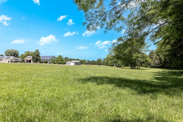 120 E Kennedy Blvd, Buffalo, MO 65622 - view of green lawn featuring a storage unit