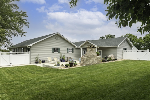 120 E Kennedy Blvd, Buffalo, MO 65622 - rear view of property with a gate, a patio area, roof with shingles, and a fenced backyard