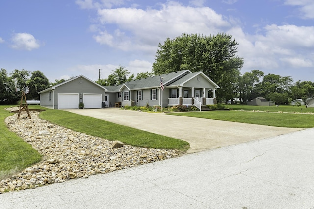 120 E Kennedy Blvd, Buffalo, MO 65622 - ranch-style house featuring a porch, an attached garage, driveway, and a front lawn