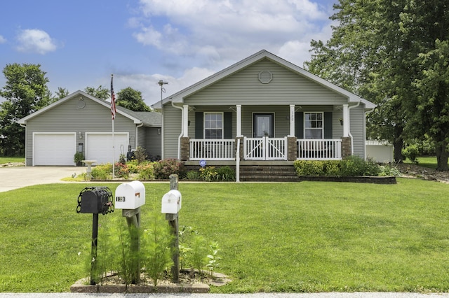 120 E Kennedy Blvd, Buffalo, MO 65622 - view of front of house with driveway, a porch, and a front lawn