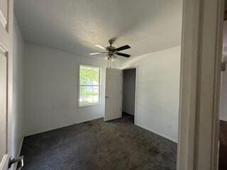 315 S Market St, Nixa, MO 65714 - unfurnished bedroom with carpet, a closet, and a ceiling fan