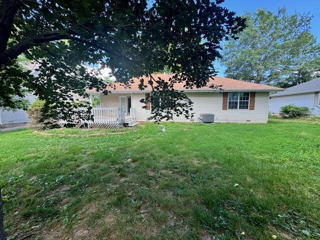 315 S Market St, Nixa, MO 65714 - back of property with a deck and a yard