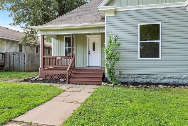 1156 W Lynn St, Springfield, MO 65802 - view of front facade with board and batten siding, a porch, and roof with shingles