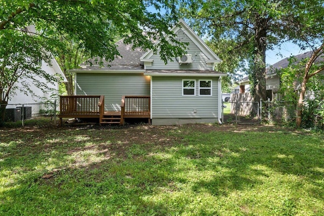 1156 W Lynn St, Springfield, MO 65802 - rear view of property featuring a wooden deck, a gate, and roof with shingles