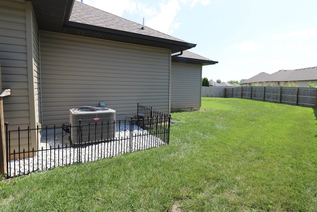 1224 S Mulberry Ave, Springfield, MO 65802 - fenced backyard with a patio