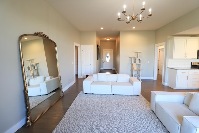 1224 S Mulberry Ave, Springfield, MO 65802 - living room featuring dark wood-style flooring, a chandelier, and recessed lighting