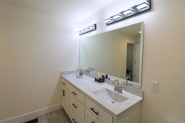 1224 S Mulberry Ave, Springfield, MO 65802 - bathroom with double vanity and baseboards