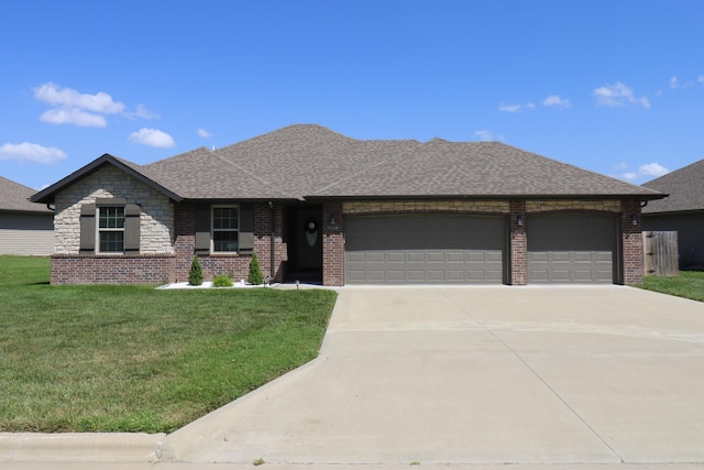 1224 S Mulberry Ave, Springfield, MO 65802 - view of front of house featuring concrete driveway, an attached garage, a shingled roof, a front yard, and brick siding