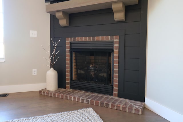 1224 S Mulberry Ave, Springfield, MO 65802 - detailed view of a fireplace and wood finished floors