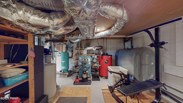 147 W Shore Rd, Shohola, PA 18458 - unfinished basement with water heater, a baseboard heating unit, a heating unit, and concrete block wall