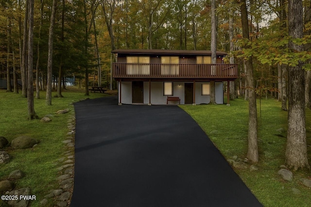 179 Forest Ridge Dr, Hawley, PA 18428 - view of front facade with a front yard, driveway, and a wooden deck