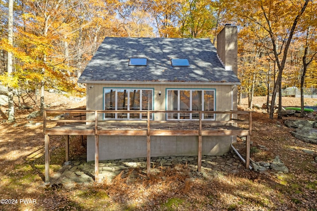 rear view of house with a deck