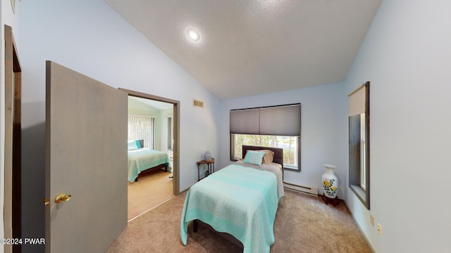 carpeted bedroom featuring lofted ceiling, multiple windows, and a baseboard heating unit