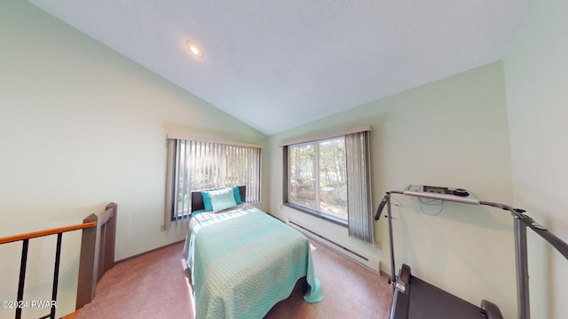 carpeted bedroom with vaulted ceiling and a baseboard heating unit