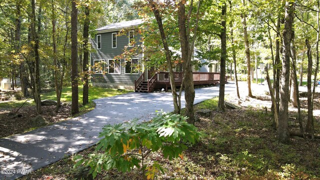 view of front of house featuring a wooden deck