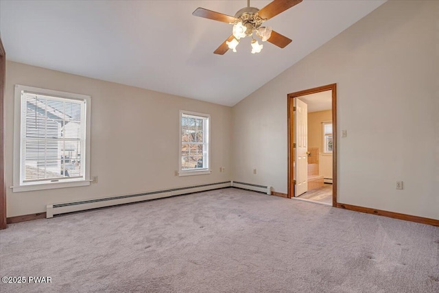 carpeted spare room featuring baseboards, a ceiling fan, lofted ceiling, and a baseboard radiator