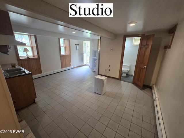 27 Maple Trail, Trail, NY 12790 - spare room featuring a baseboard heating unit and light tile patterned floors