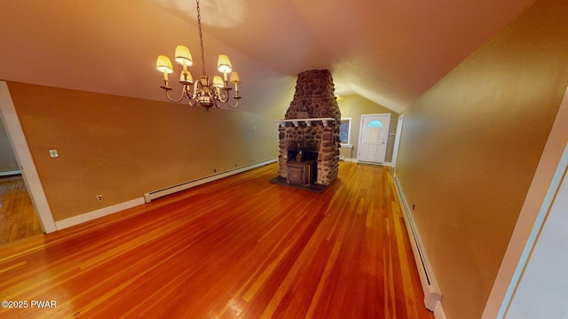 27 Maple Trail, Trail, NY 12790 - unfurnished living room with a baseboard heating unit, wood finished floors, vaulted ceiling, and a chandelier