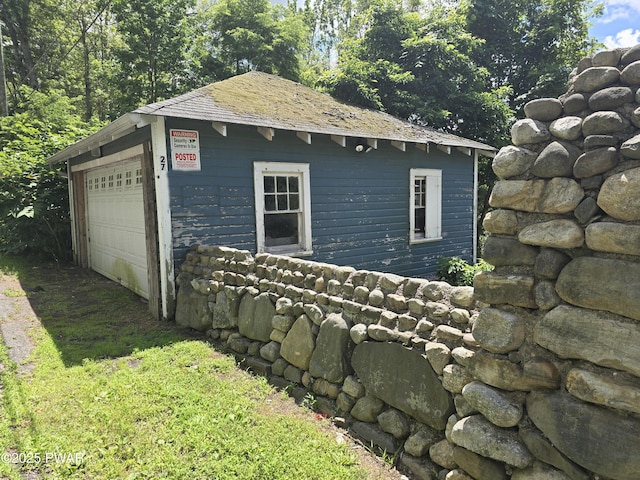 27 Maple Trail, Trail, NY 12790 - view of property exterior featuring an outdoor structure and a garage
