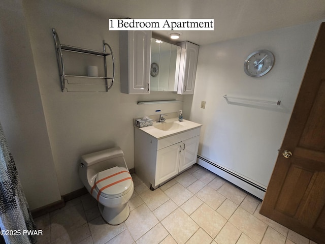 27 Maple Trail, Trail, NY 12790 - bathroom with a baseboard heating unit, vanity, and tile patterned flooring