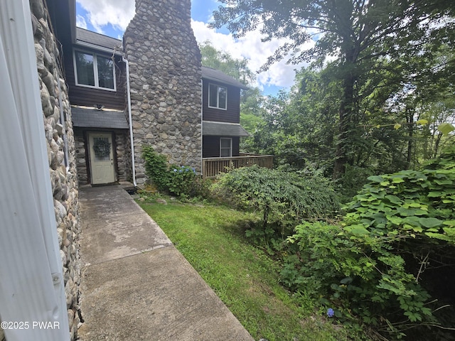 27 Maple Trail, Trail, NY 12790 - entrance to property with a chimney and stone siding